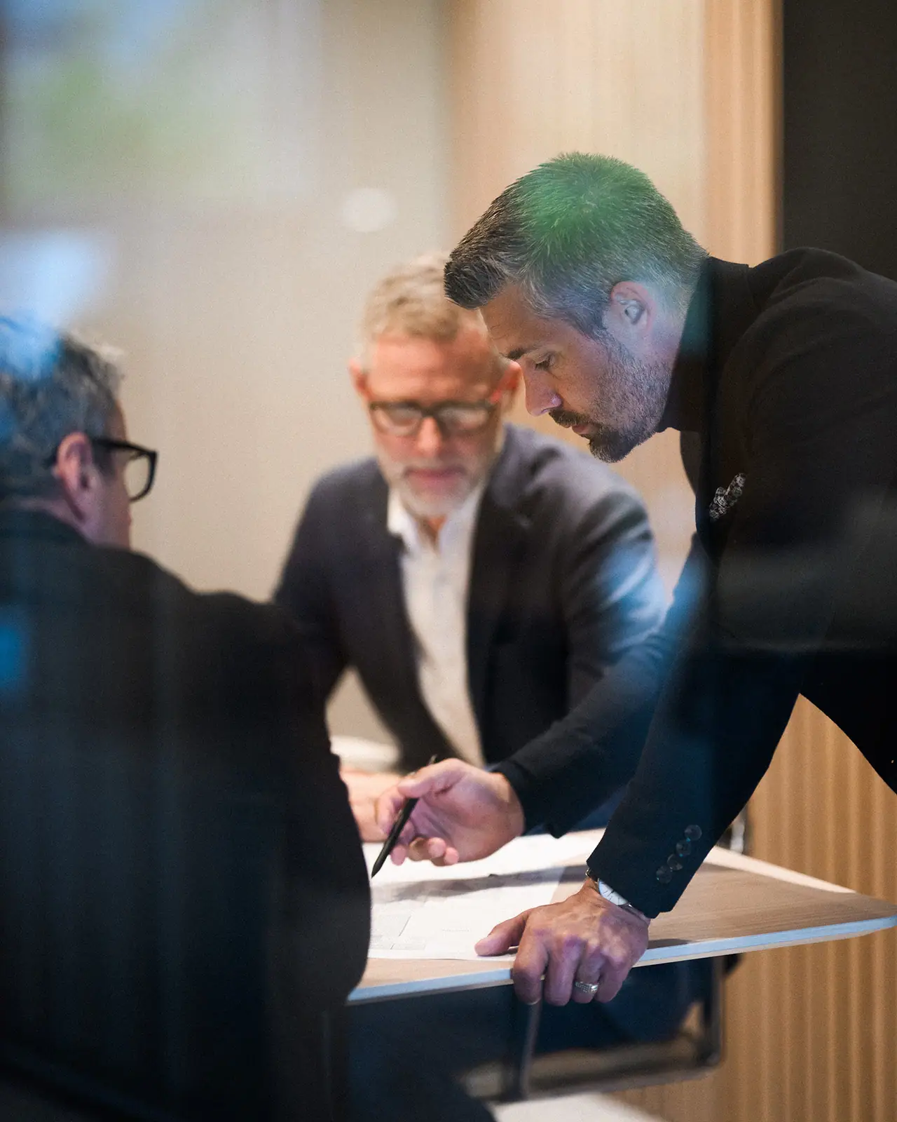 Metra brokers reviewing a project